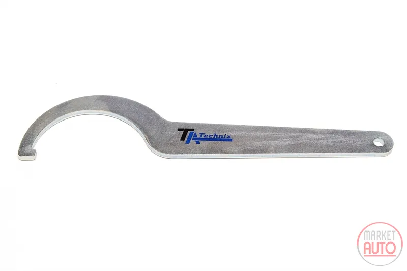 Llave de ajuste para el apoyo de resorte de bobina